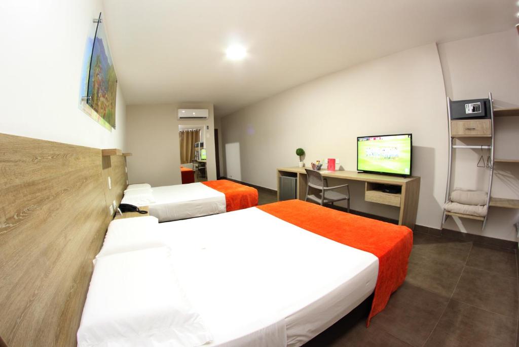 TV a/nebo společenská místnost v ubytování Hotel Genova Centro