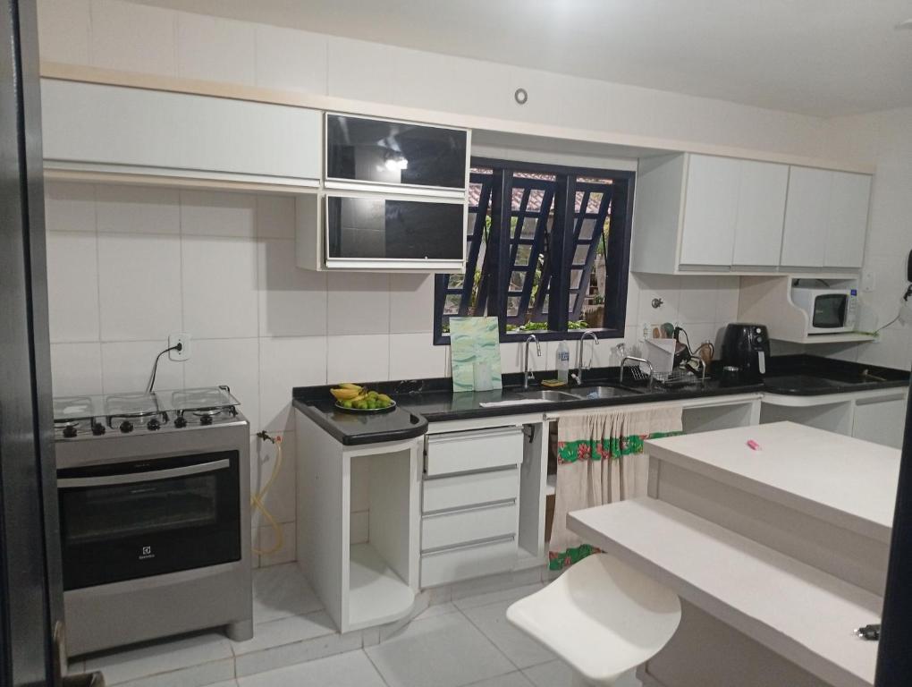 Kuchyň nebo kuchyňský kout v ubytování Pousada Recanto da Mata