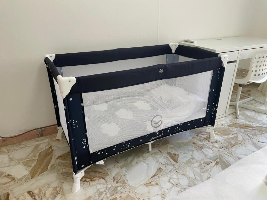 En eller flere senge i et værelse på Casa Giulia, comoda palazzina indipendente