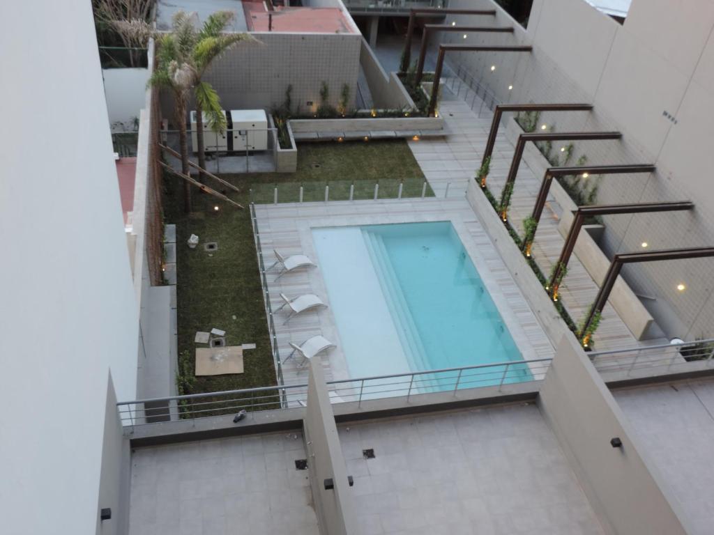 an overhead view of a swimming pool on a building at Metropolitan Lacroze in Buenos Aires