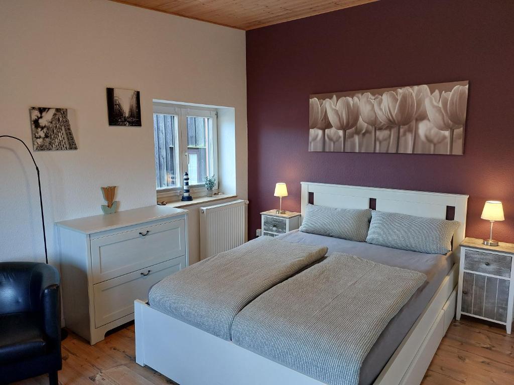 En eller flere senge i et værelse på Krückeberg-Appartements