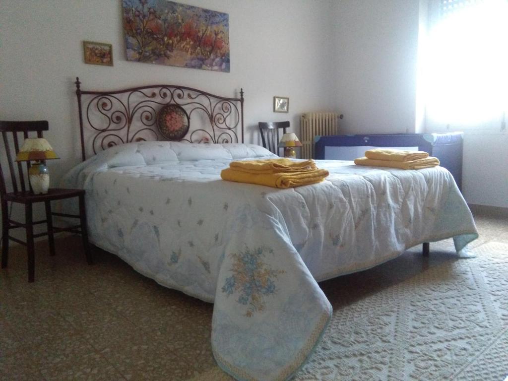 Postel nebo postele na pokoji v ubytování B&B Notte Al Museo