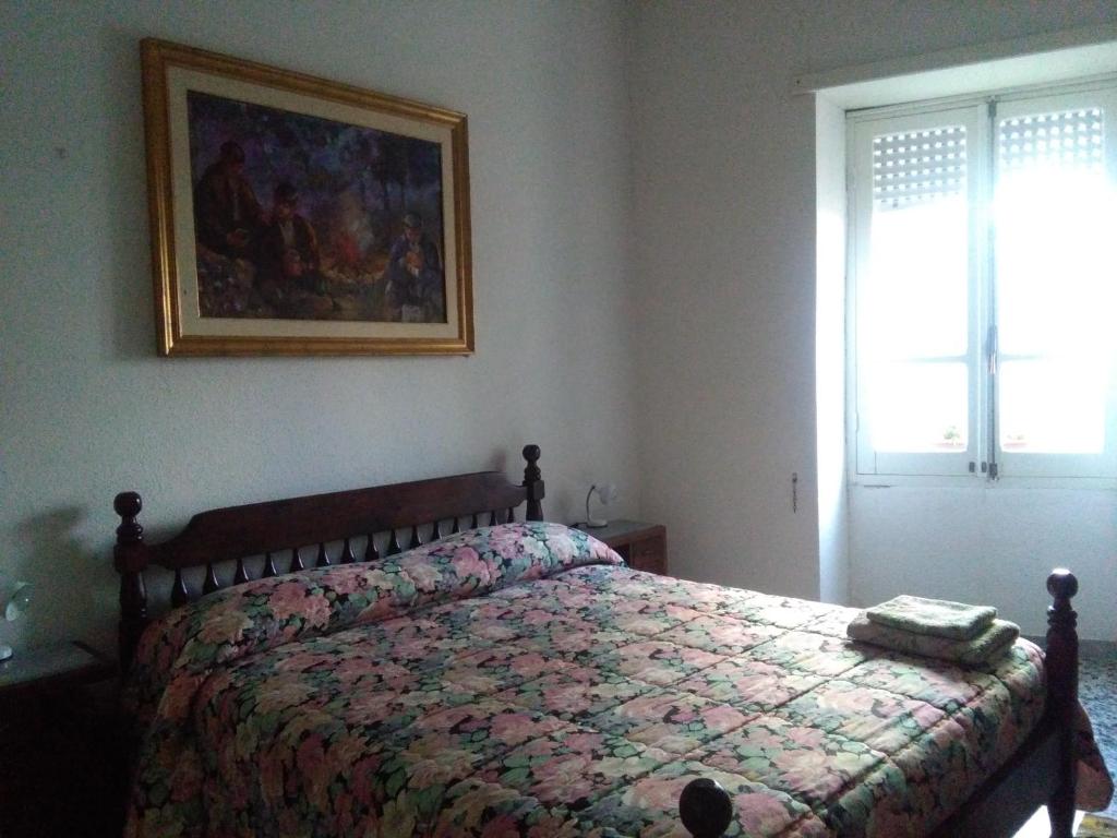 Postel nebo postele na pokoji v ubytování B&B Notte Al Museo