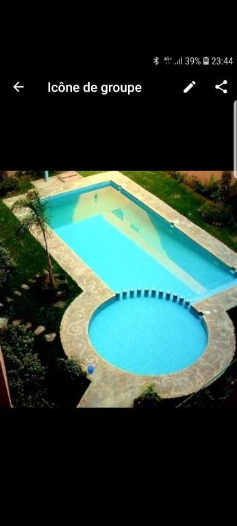 an overhead view of a large swimming pool at L'hivernage andalouse 4 in Marrakesh