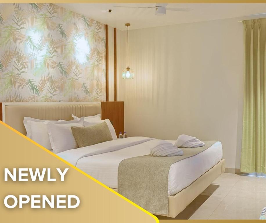 Giường trong phòng chung tại Len R Inn