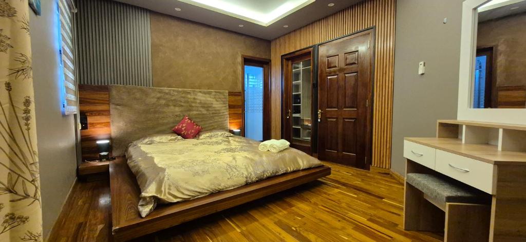 Giường trong phòng chung tại SmitAnu Villa - Where Luxury Meets Convenience!