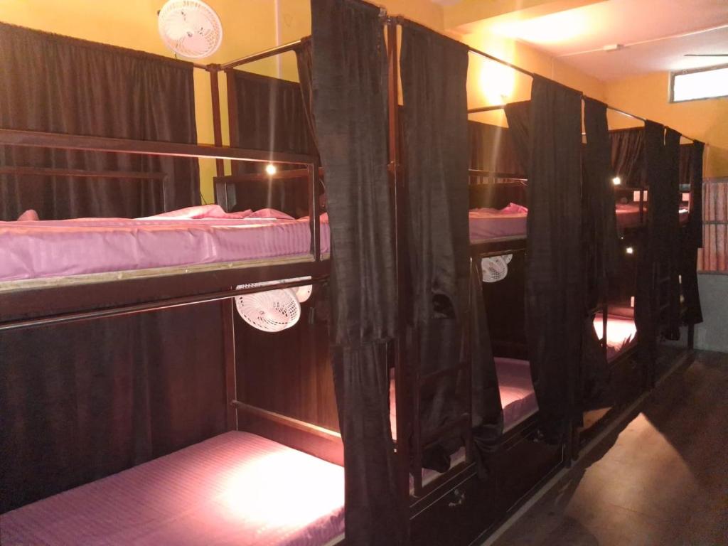 a group of bunk beds in a room at Shri Ashray in Varanasi