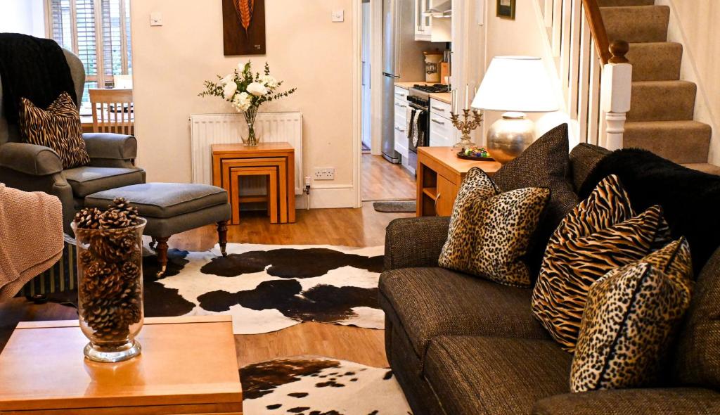 a living room with a couch and a table at The Walmer Retreat in Deal