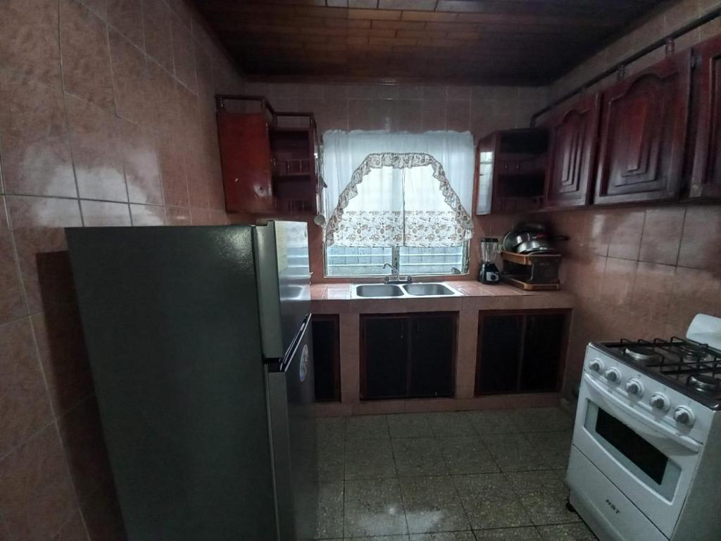 Kuchyň nebo kuchyňský kout v ubytování Hospedaje carvajal