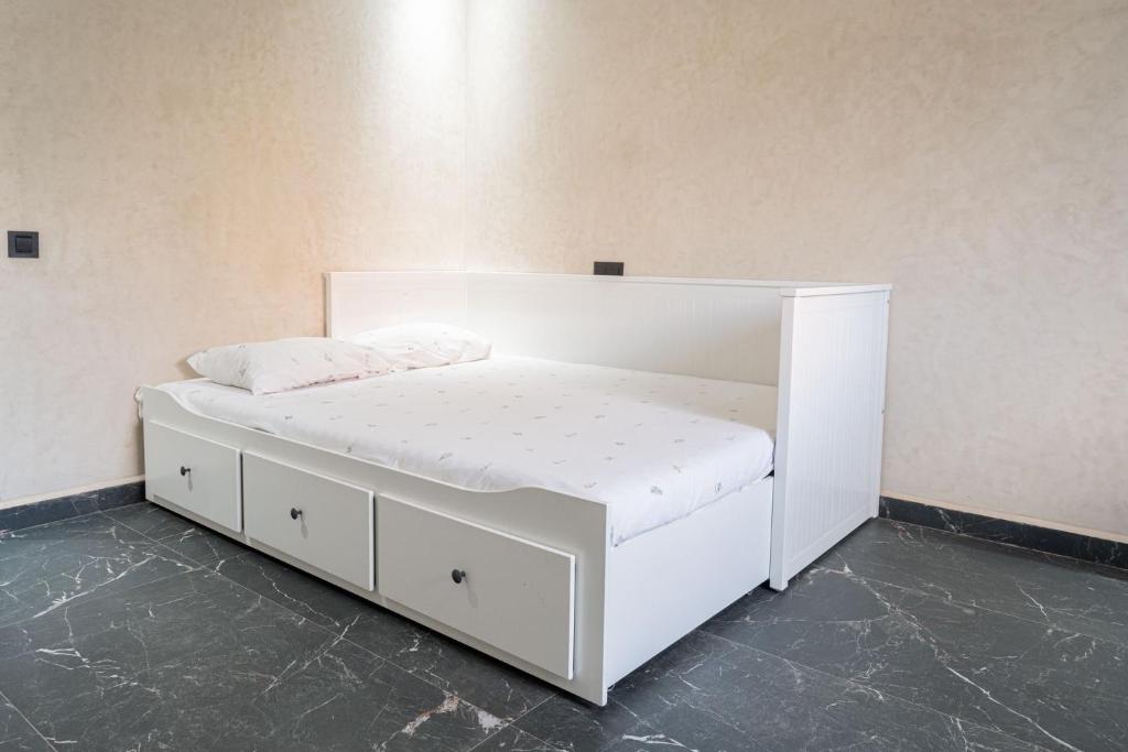 Postel nebo postele na pokoji v ubytování Atlas front