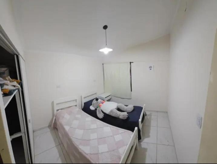 En eller flere senge i et værelse på Viviendas por venir