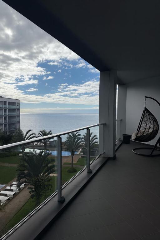 a balcony with a view of the ocean at Madeira Palace Ocean View in Funchal