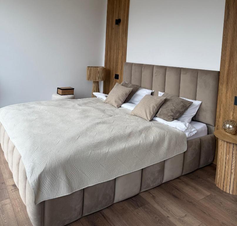 Postel nebo postele na pokoji v ubytování Nest House