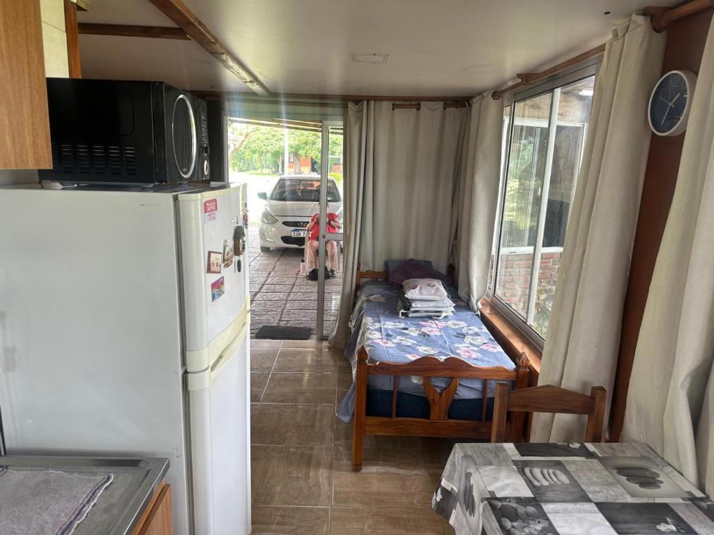 Et tv og/eller underholdning på Casa termas guaviyu