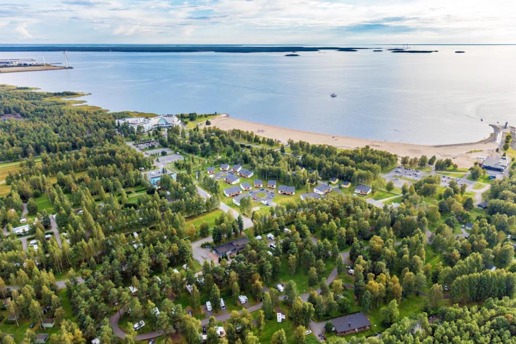 an aerial view of a resort on the shore of a beach at Nallikari Holiday Village Cottages in Oulu