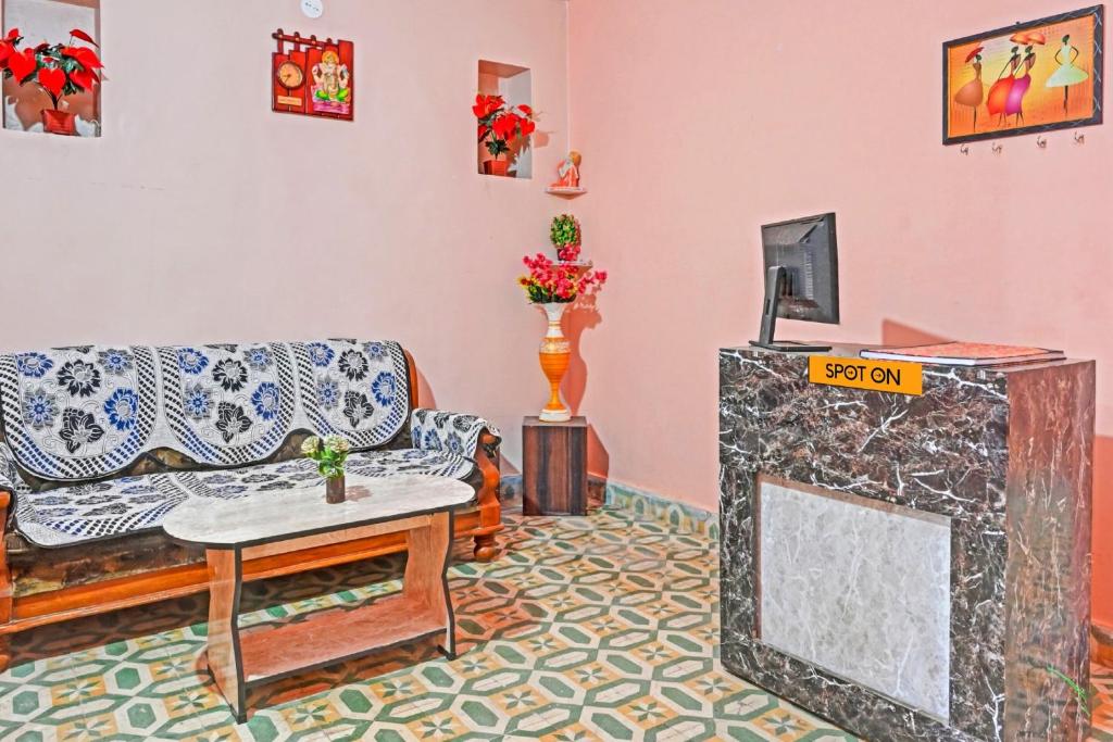 Et tv og/eller underholdning på Super HOTEL O MAA NARMADA