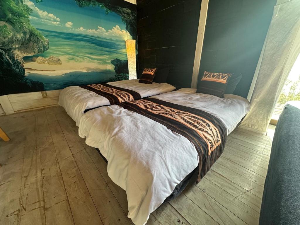 En eller flere senge i et værelse på Tiny Camp House Kurage - Vacation STAY 65999v