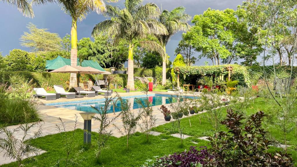 Swimmingpoolen hos eller tæt på Uyoga House