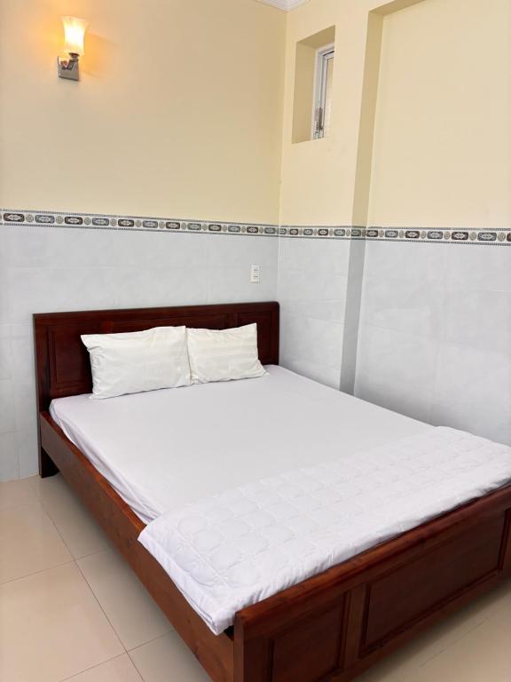 En eller flere senge i et værelse på Motel LIÊN ANH