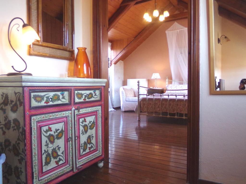 A bed or beds in a room at Alegria Villas Complex