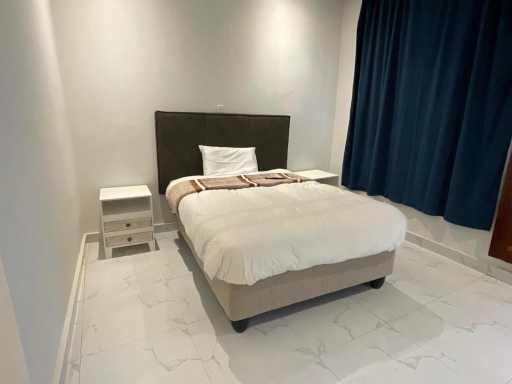 Postel nebo postele na pokoji v ubytování Kwetu Guest House Ndola