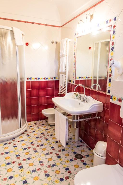 Koupelna v ubytování Hotel Giordano