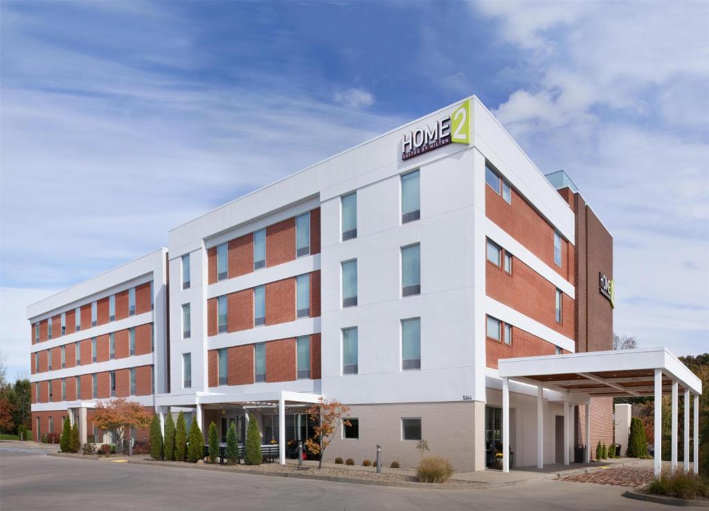 an office building with the name of the hotel at Home2 Suites by Hilton Canton in North Canton