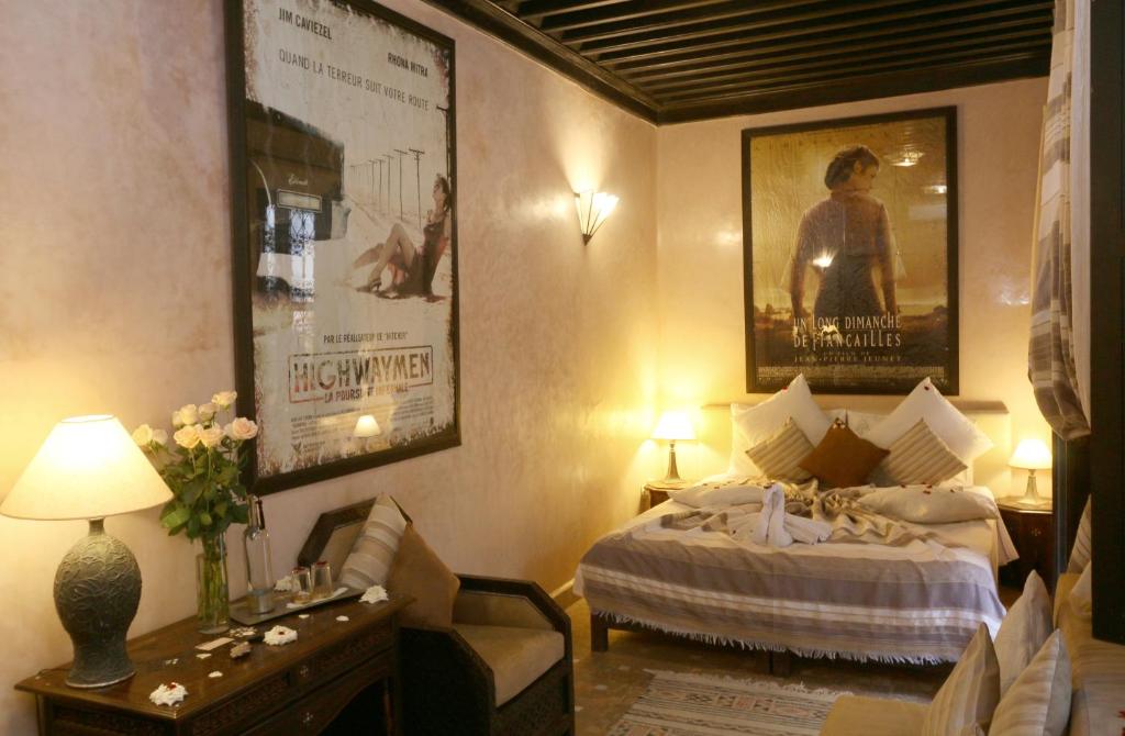A bed or beds in a room at Riad Anjar