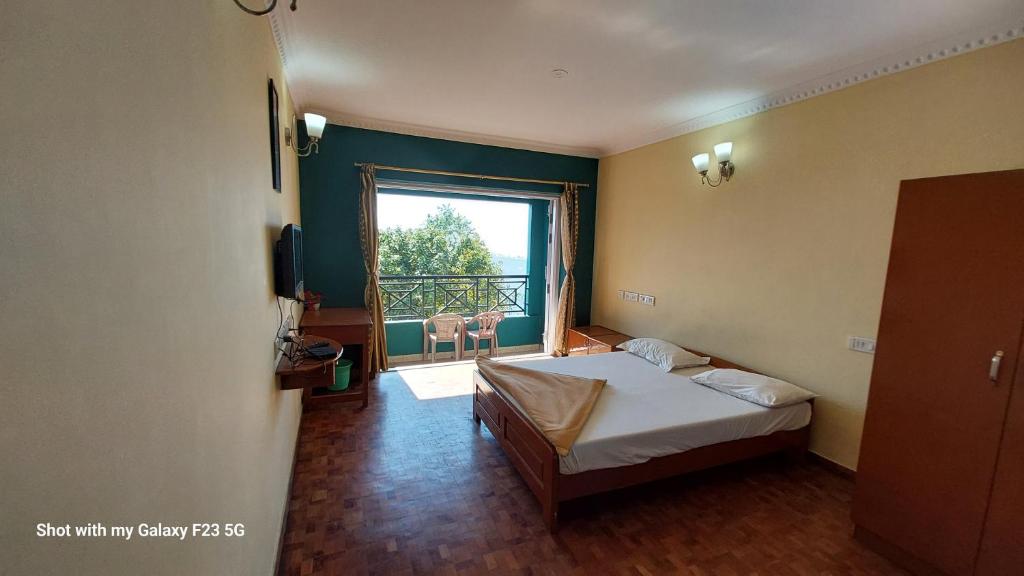 En eller flere senge i et værelse på NSN Home stay