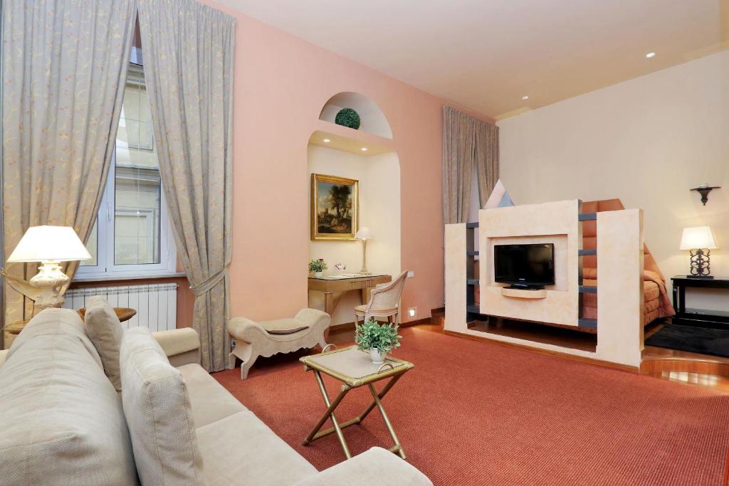 A seating area at Rome in your heart - Spagna apartment