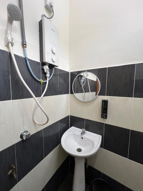 Phòng tắm tại Mumtaz Beach Homestay 2