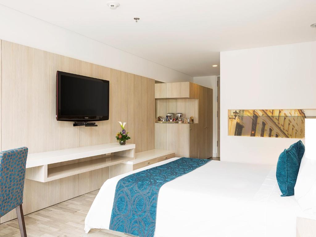 TV a/nebo společenská místnost v ubytování Hotel bh Bicentenario