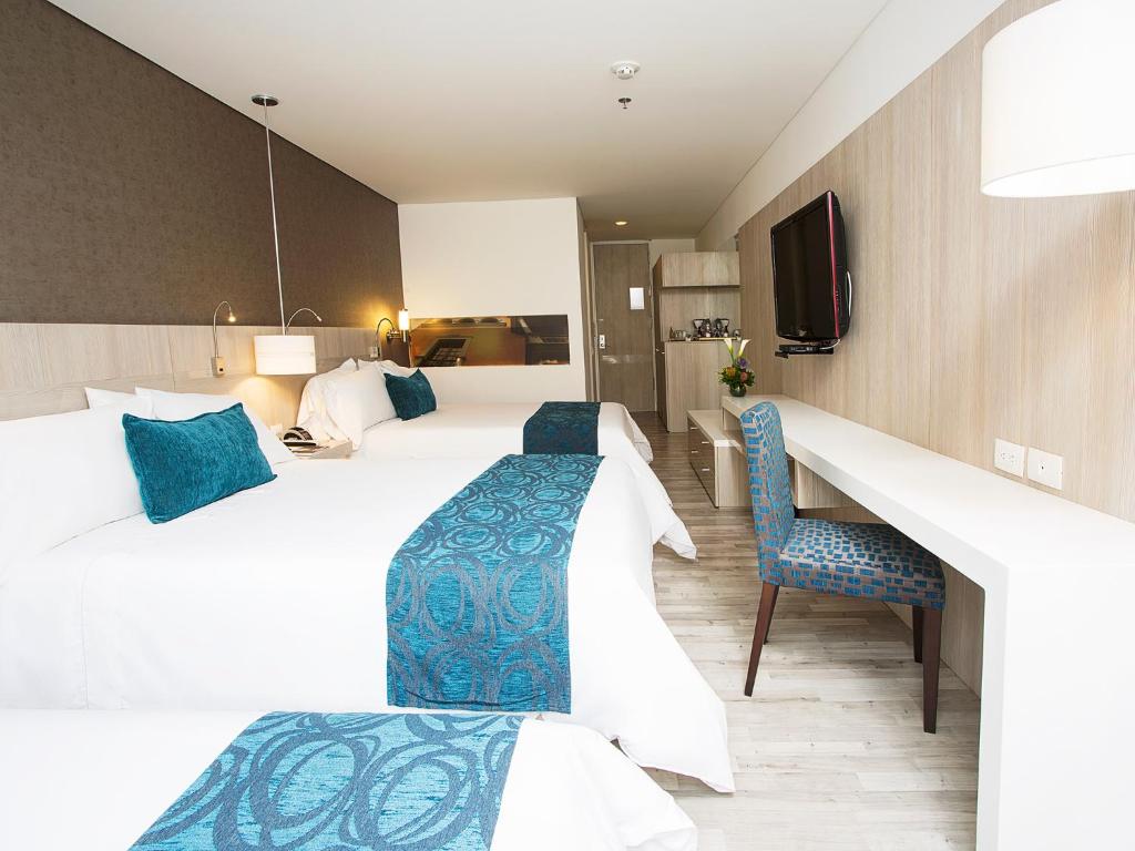 TV a/nebo společenská místnost v ubytování Hotel bh Bicentenario