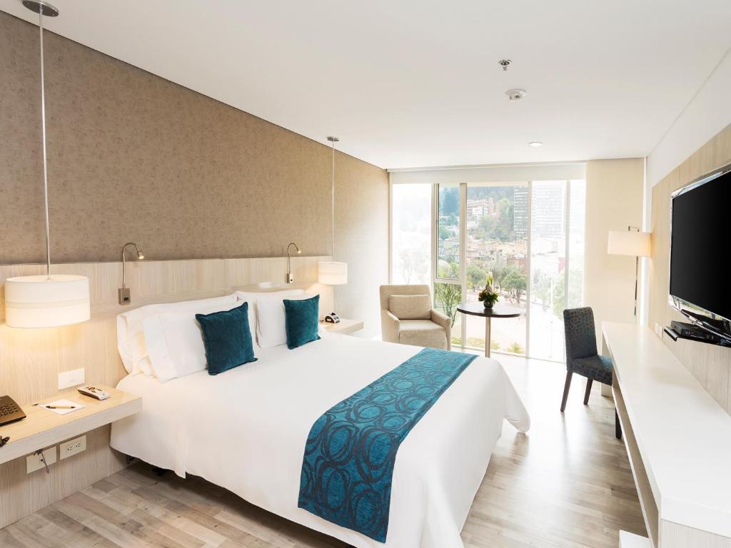 Postel nebo postele na pokoji v ubytování Hotel bh Bicentenario