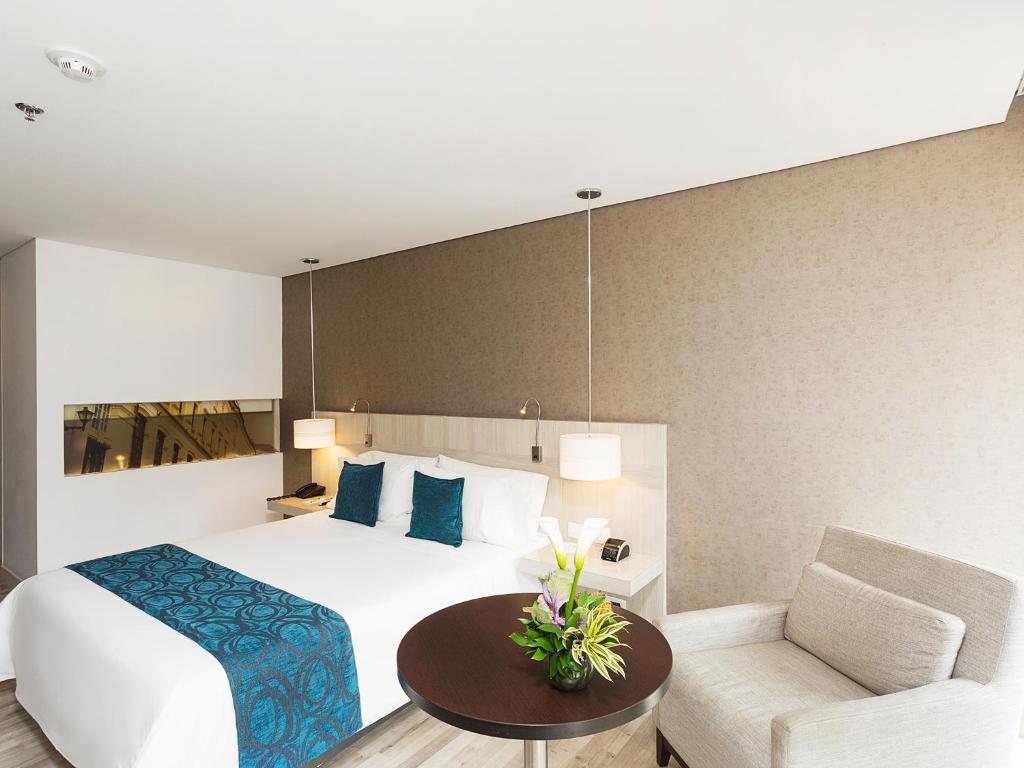 Postel nebo postele na pokoji v ubytování Hotel bh Bicentenario