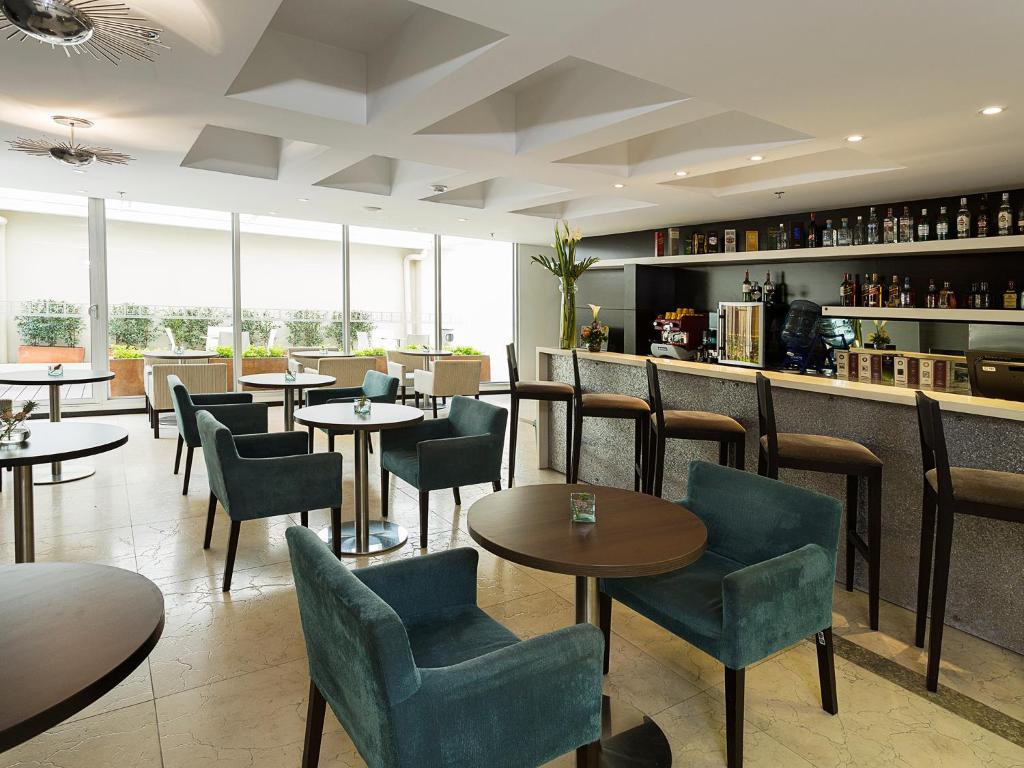 Nápoje v ubytování Hotel bh Bicentenario