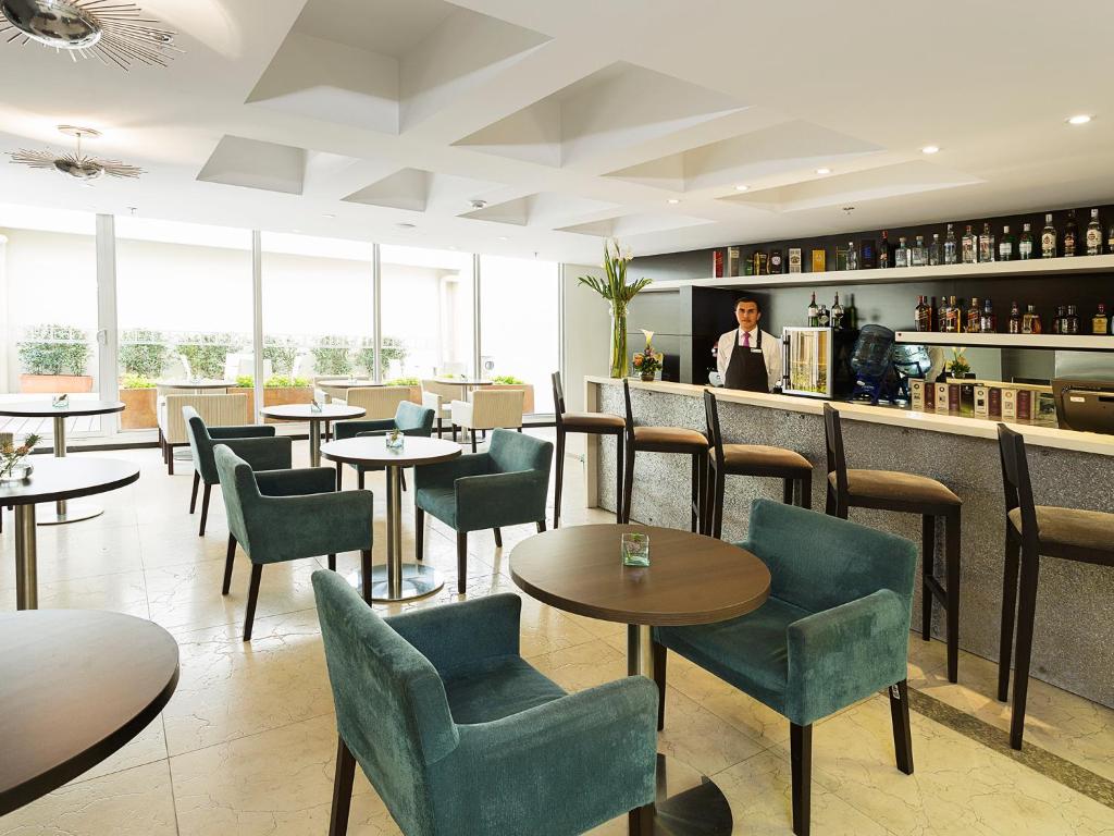 Posezení v ubytování Hotel bh Bicentenario