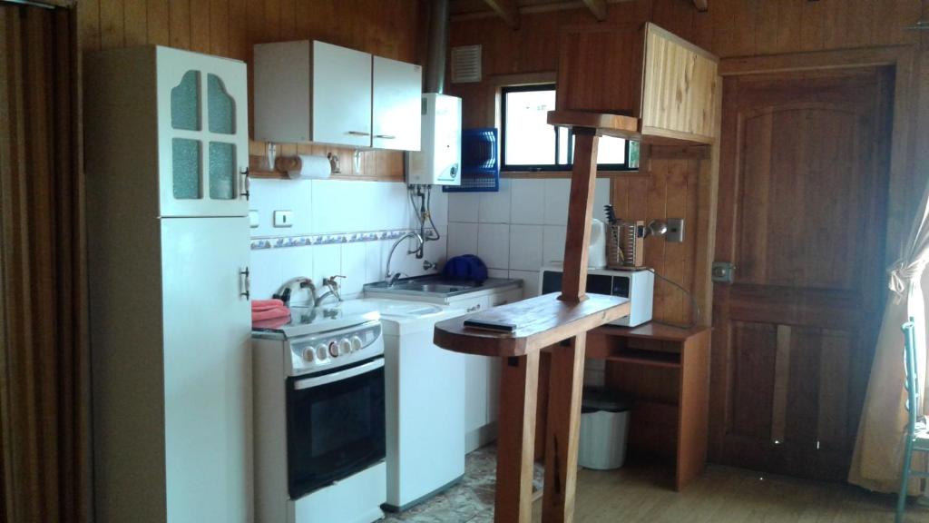 Kuchyň nebo kuchyňský kout v ubytování Cabañas Quito