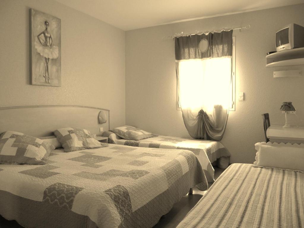 Hôtel Le Colombier - Habitación Cuádruple