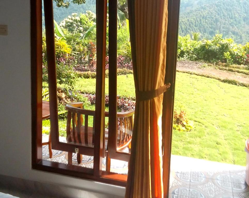 Zahrada ubytování Aris Homestay and Warung Made