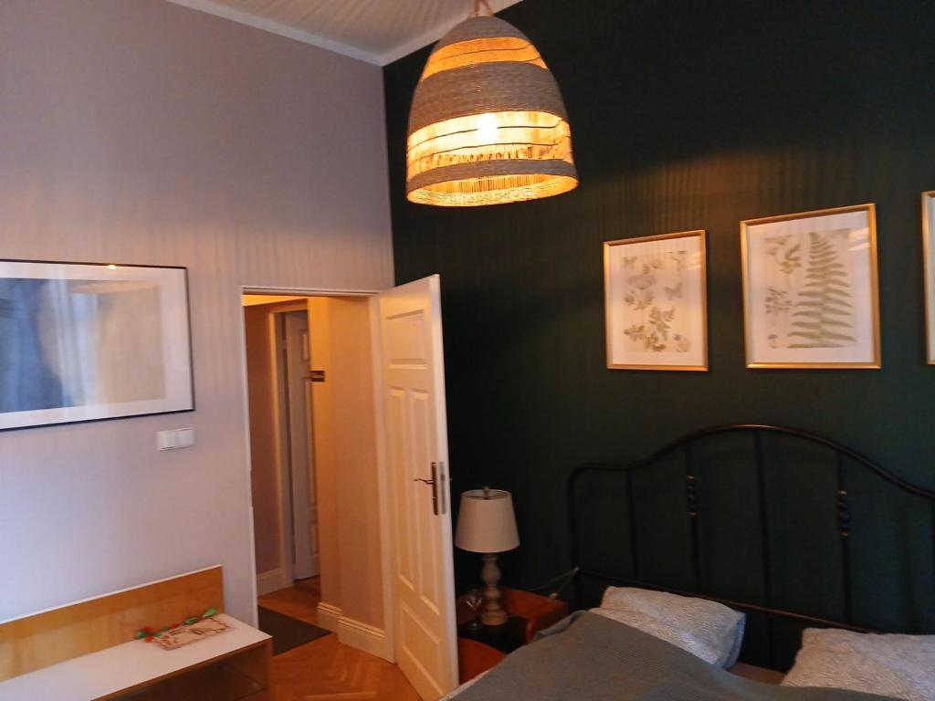 Giường trong phòng chung tại Italiano Vero Apartamenty