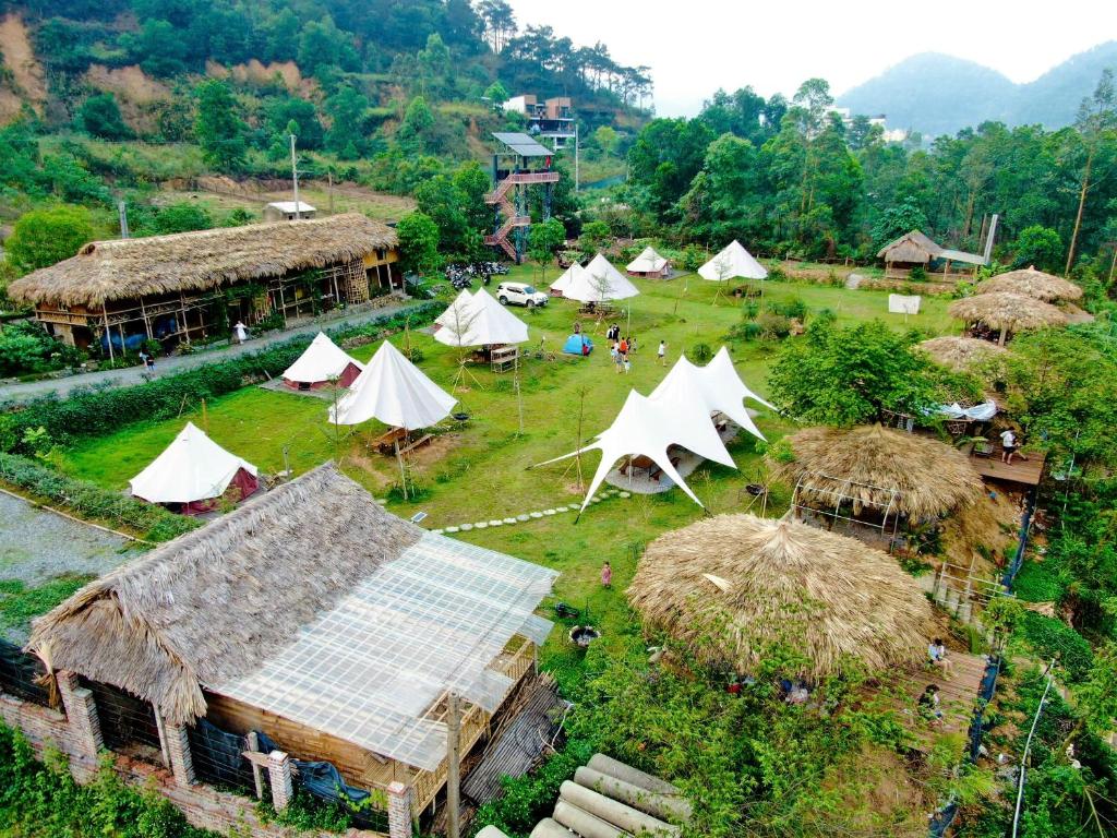 an aerial view of a village with tents at Lagom Village-Glamping Site- Đồng Đò lake view in Hanoi