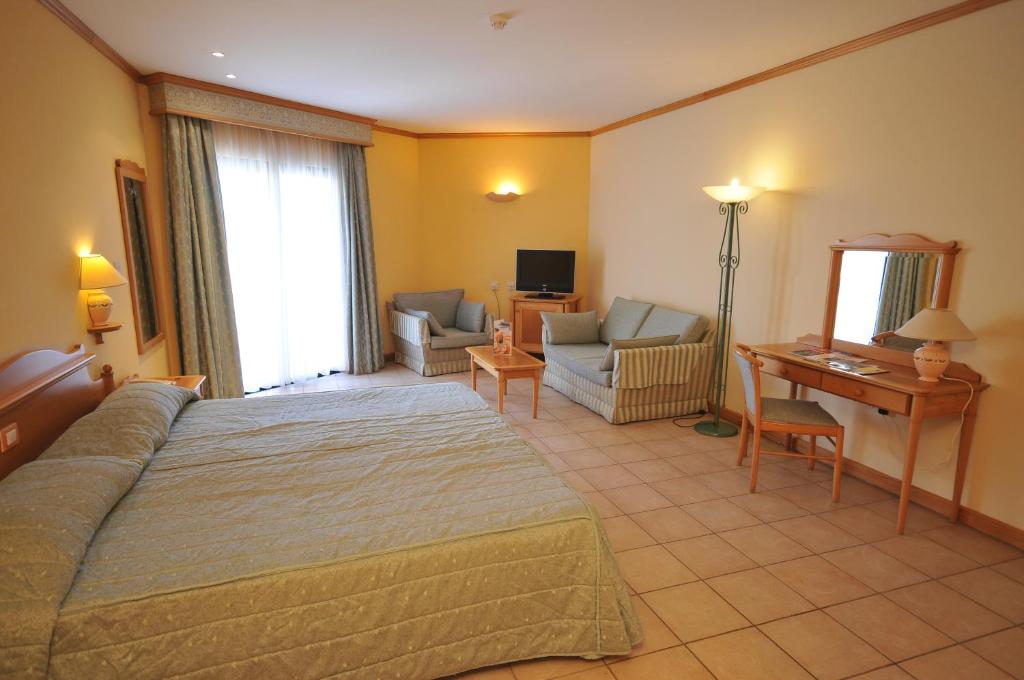Voodi või voodid majutusasutuse Grand Hotel Gozo toas