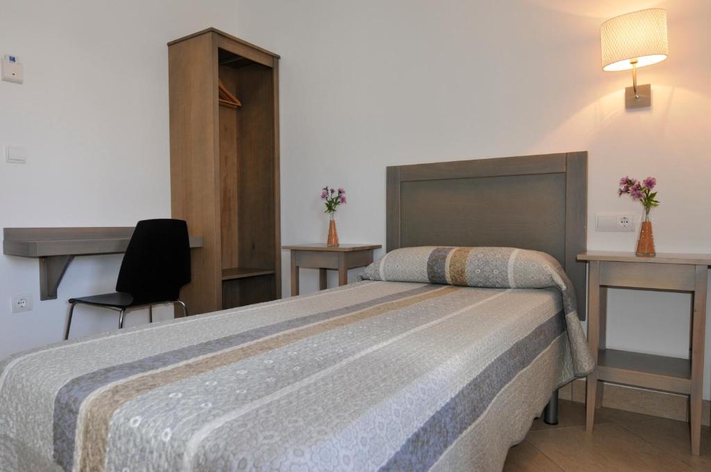 Posteľ alebo postele v izbe v ubytovaní Hostal Tarifa -Recepcion abierta las 24h-
