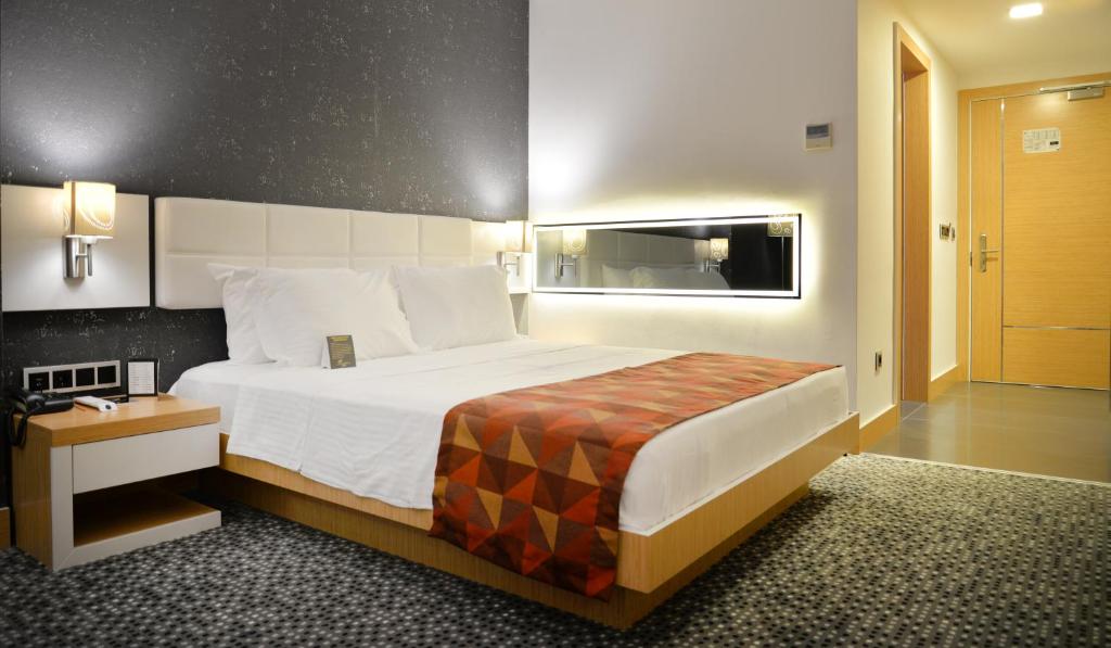 Postel nebo postele na pokoji v ubytování Inci Class Hotel