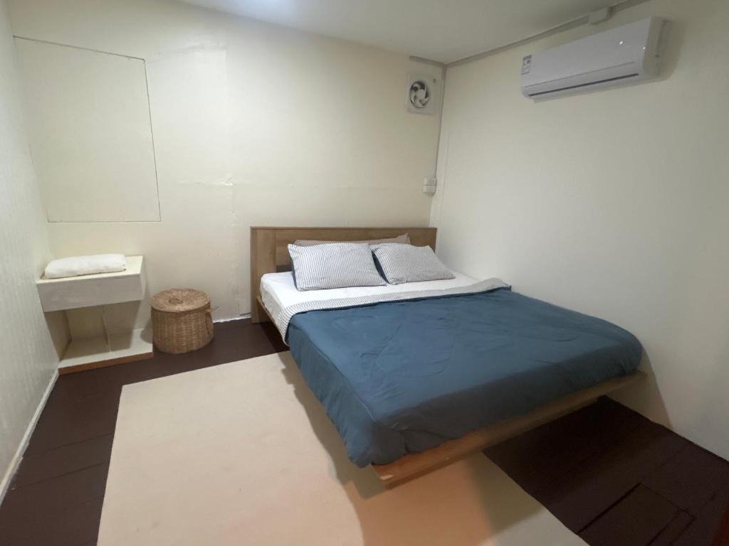 En eller flere senge i et værelse på Searyn Lanta