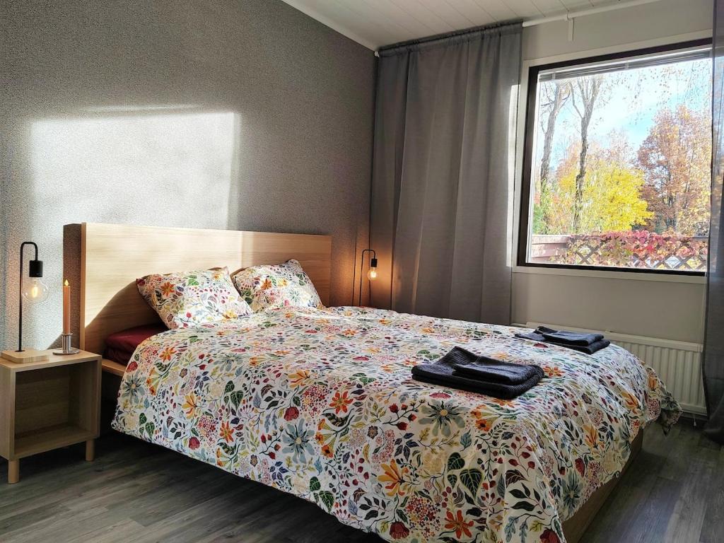 En eller flere senge i et værelse på Row House near LUT and LAB Campus - Sauna - 24 Self Check-in