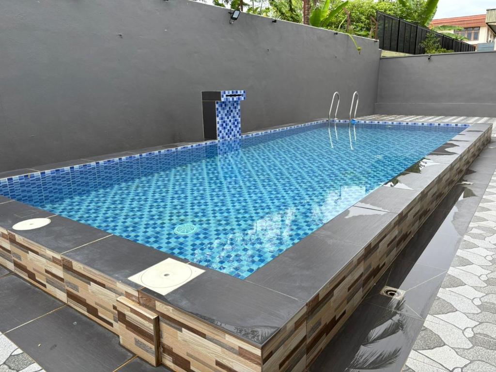 Swimmingpoolen hos eller tæt på 786 Bali Top Homestay