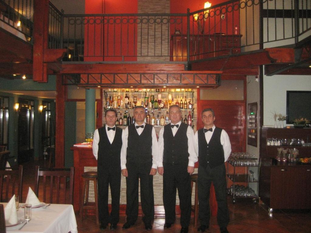 Členové personálu v ubytování Hotel Topcider