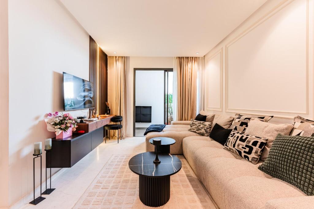 TV a/nebo společenská místnost v ubytování New Architect & Design Studio - CFC & Maarif